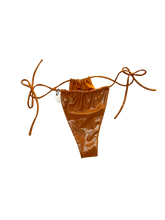 Load image into Gallery viewer, tie side metallic wet look bikini bottom in tangerine
